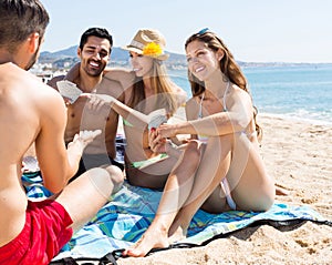 Group of people playing cards