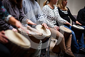 Group of people playing on drums