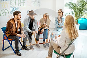 Group of people during the psychological therapy indoors