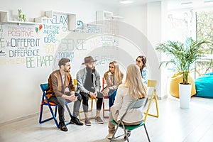 Group of people during the psychological therapy indoors