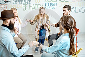 Group of people during the psychological therapy indoors