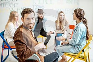 Group of people during the psychological therapy indoors