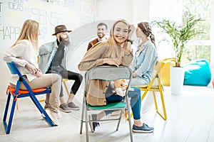 Group of people during the psychological therapy indoors