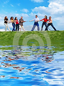 Group of people pulling the rope