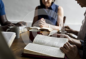 Group of people are reading bible together