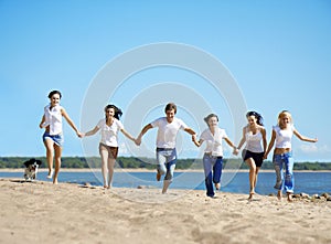 Group of people relaxing on the beach