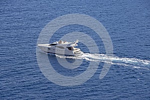 Group of  people sail on luxury motor boat