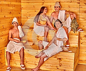 Group people in Santa hat at sauna