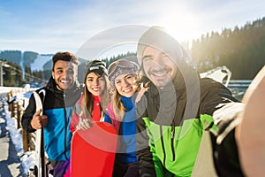 Group Of People Ski Snowboard Resort Winter Snow Mountain Happy Smiling Friends Taking Selfie Photo