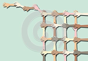 Group of people stacking hands shows unity and teamwork.