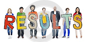 Group of People Standing Holding Result Letter photo