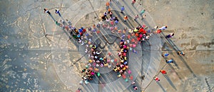 Group of People Standing in the Shape of a Star