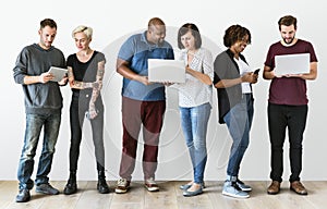 Group of people using electronics device