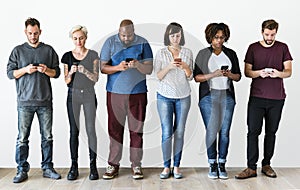 Group of people using mobile phone