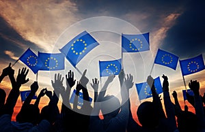 Group of People Waving European Union Flags