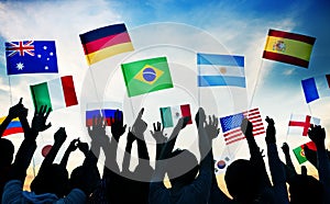 Group of People Waving National Flags