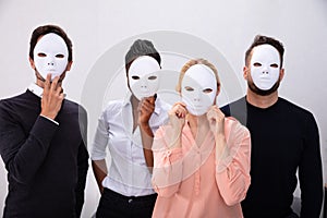 Group Of People Wearing White Masks