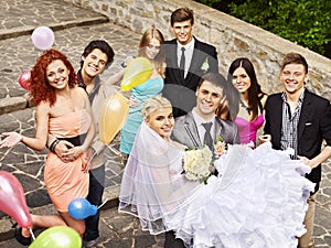 Group people at wedding outdoor.