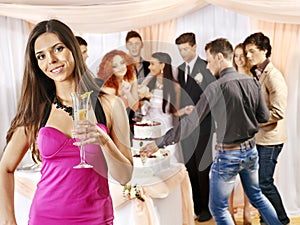 Group people at wedding table.