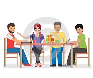 Group of people working around the table