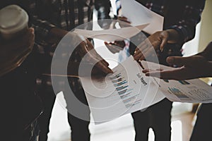 A group of people working man and woman in the plaid shirt Talking/consulting/idea about doing business. teamwork business meeting