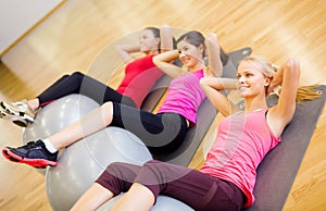 Group of people working out in pilates class