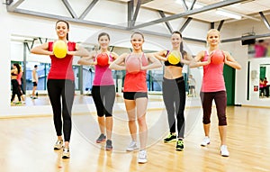 Group of people working out with stability balls