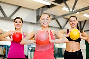 Group of people working out with stability balls