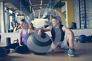 Group of people workout in healthy club.