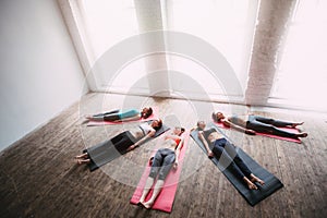 Group perfect figure women yoga relax after a workout.