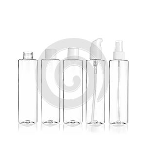 Group of PET cosmetic transparent bottles isolated on white background with disc top cap, flip cap, lotion pump and spray pump.