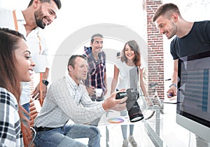 Group photo of editors working in a modern office.