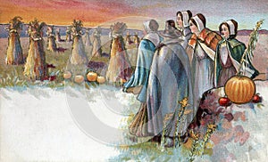 Pilgrims in field at Sunset photo