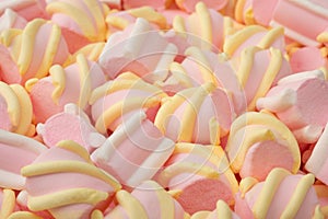 Group of pink marshmallows close-up. Colorful marshmallow candies for background use