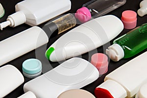 Group of plastic bodycare bottle Flat lay composition with cosmetic products on colored background empty space for you