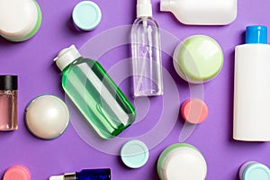 Group of plastic bodycare bottle Flat lay composition with cosmetic products on colored background empty space for you