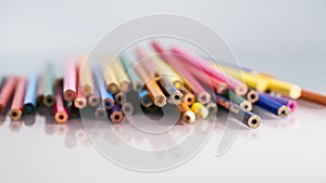Group of pointless colored pencils with details and reflexions