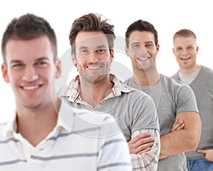 Group portrait of happy young men