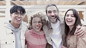 Group portrait of multiracial friends smiling at camera