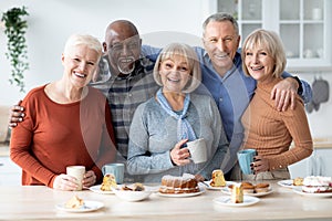 Group portrait of multiracial senior friends enjoying time together