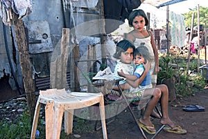 Group portrait of poor Paraguayan children in slum