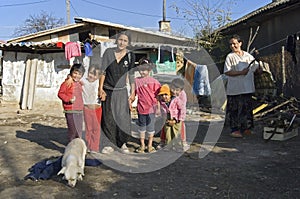 Group portrait of Roma family, mother and children