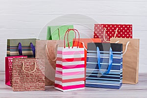 Group of printed paper shopping bags. photo