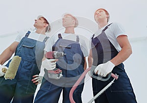 Group of professional industrial workers. Isolated over white background.