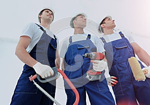 Group of professional industrial workers. Isolated over white background.