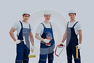 Group of professional industrial workers. Isolated over white background.