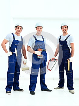 Group of professional industrial workers. Isolated over white background.