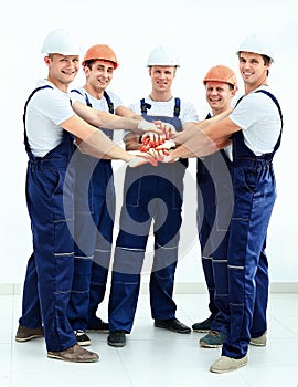 Group of professional industrial workers. Isolated over white background.