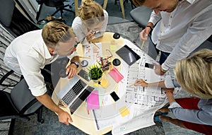 Group of project managers around the table