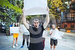 Group of protesting young people outdoors